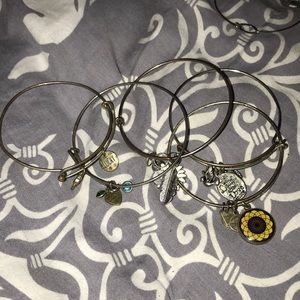 5 Alex and Ani bracelets